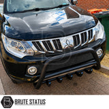 Front heavy duty carbon steel bull bar defence fitted to Black Mitsubishi L200 Series 5 suitable for overlanding set ups, all mounting hardware included. 