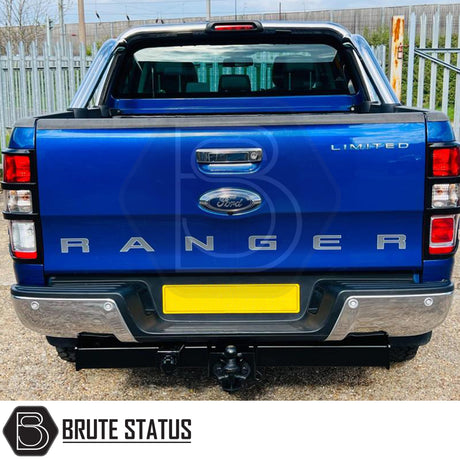 Brute Status chrome rear bumper for Ford Ranger 2012–2022 with parking sensor compatibility and non-slip step pads