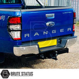 Brute Status chrome rear bumper for Ford Ranger 2012–2022 with parking sensor compatibility and non-slip step pads