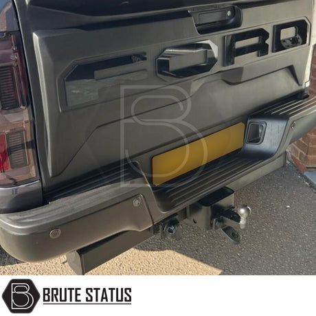 Brute Status black rear bumper for Ford Ranger 2012–2022 with parking sensor compatibility and non-slip step pads