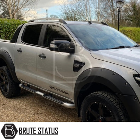 Silver roof rail kit installed on a Ford Ranger 2012–2022, high-quality aftermarket roof rails designed for added cargo and roof rack support.