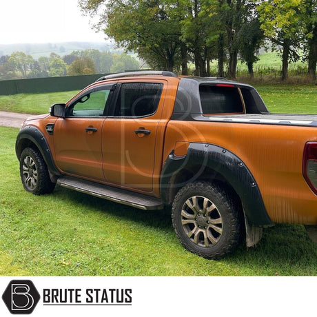 Silver roof rail kit installed on a Ford Ranger 2012–2022, high-quality aftermarket roof rails designed for added cargo and roof rack support.
