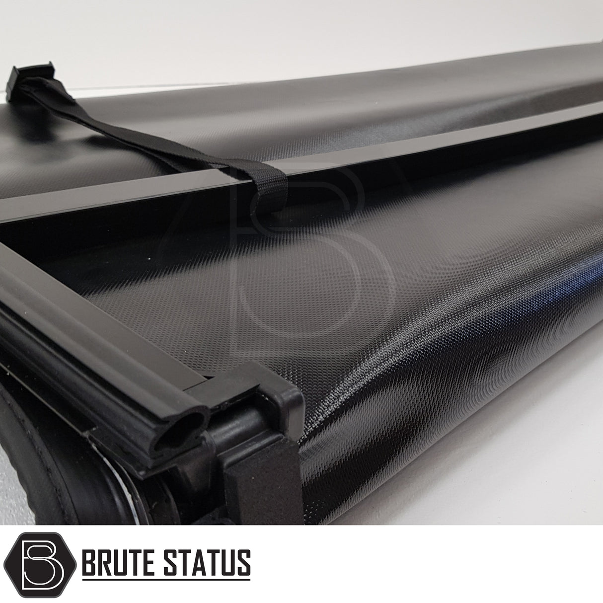 "Premium tri-fold tonneau cover for pickup trucks, featuring UV-stable vinyl, rubber perimeter seals, reinforced corners, and shaped aluminium cross bars for improved durability, aerodynamics, and water resistance. Easy no-drill installation. Not compatible with Wildtrak models with sports bars.