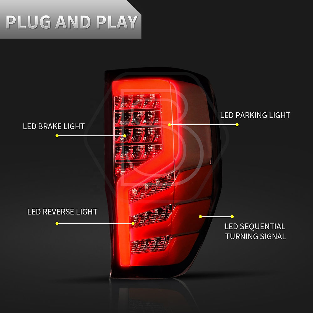 Aftermarket smoked LED tail lamps for Ford Ranger 2012-2022 with sequential turn indicators OEM style fitment and plug and play wiring. 