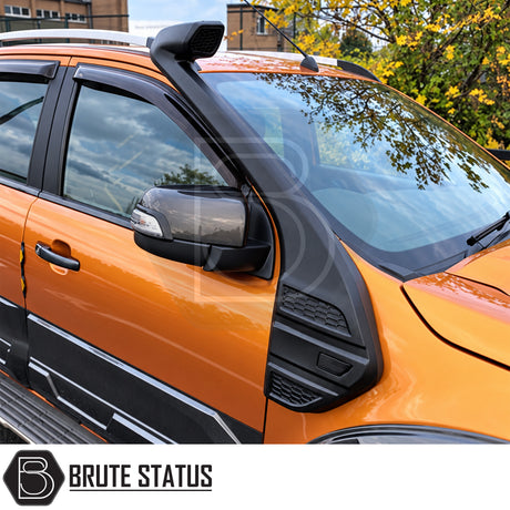Orange UK Spec Ford Ranger 2015-2019 T7 Facelift pickup truck fitted with heavy duty raised air intake snorkel featuring RAM style intake head and UV resistant LLDPE construction for 3.2 TDCi diesel engine and offroad 4x4 driving.