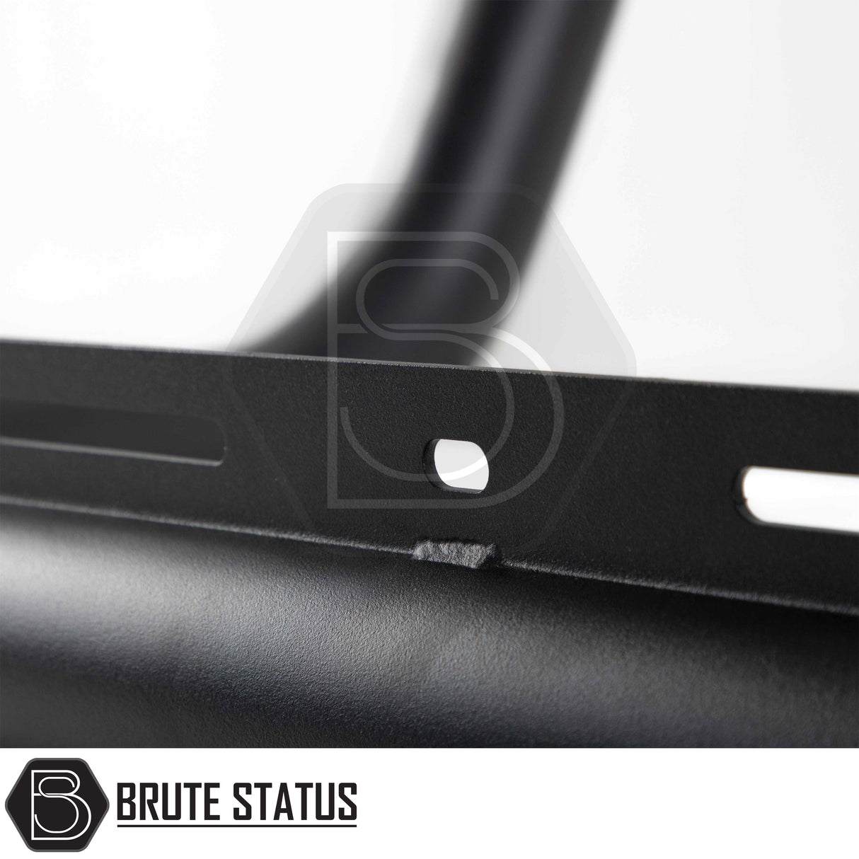Volkswagen Amarok 2023+ Bull Bar in matt black, featuring a black powder-coated steel mounting bracket with elongated slots, designed for easy DIY installation.
