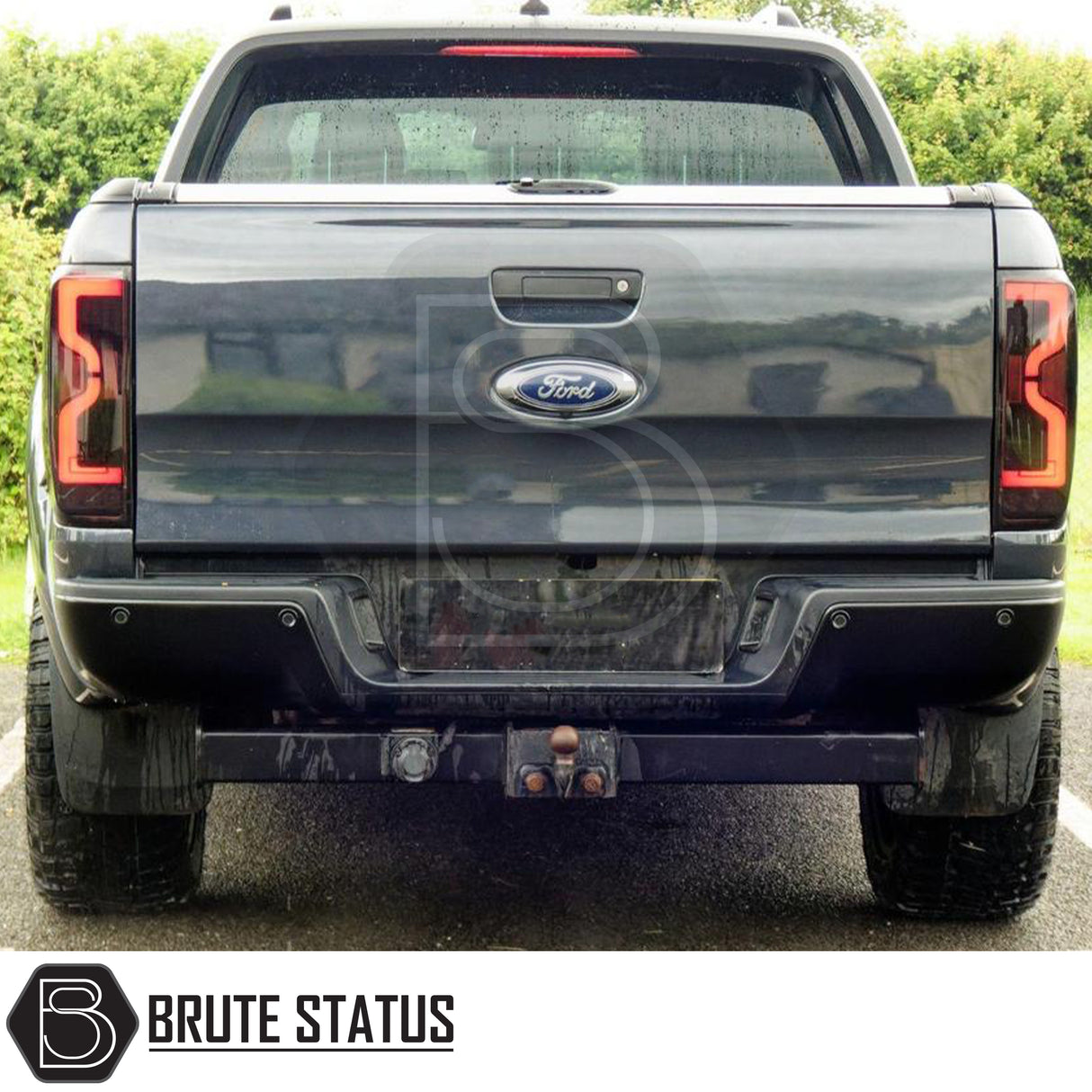 Brute Status black rear bumper for Ford Ranger 2012–2022 with parking sensor compatibility and non-slip step pads