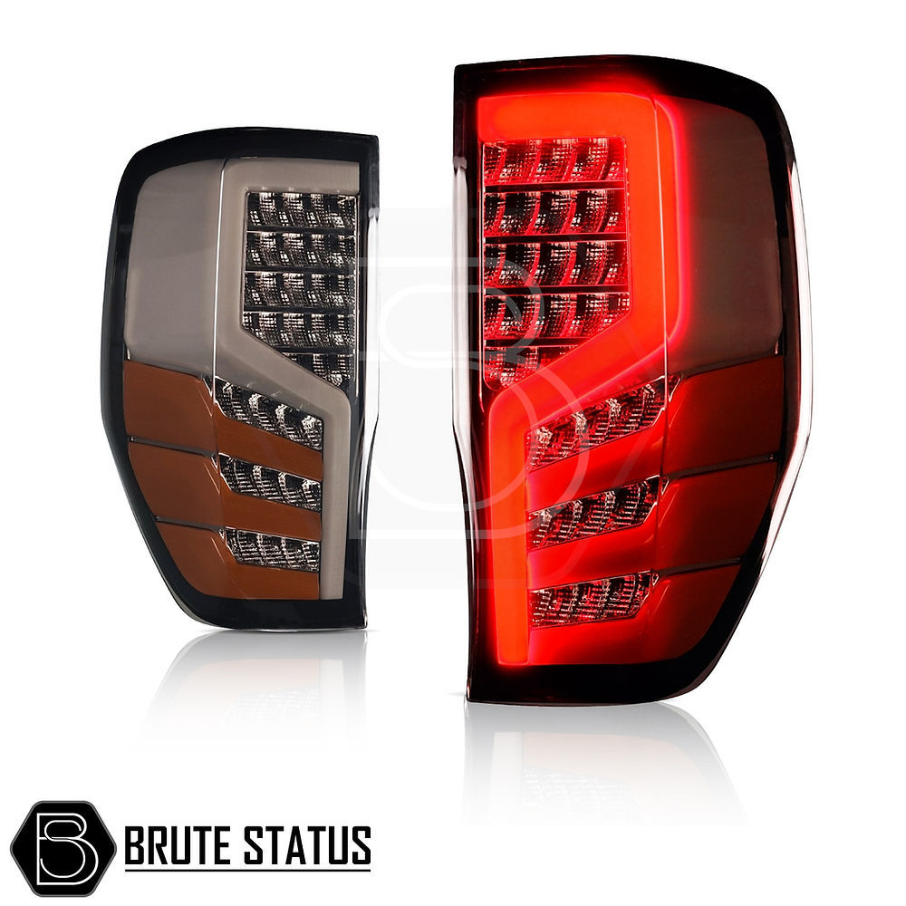 Smoked LED tail lights for Ford Ranger 2012-2022 pickup truck with sequential indicators OEM mounting points and wiring harness connectors. 