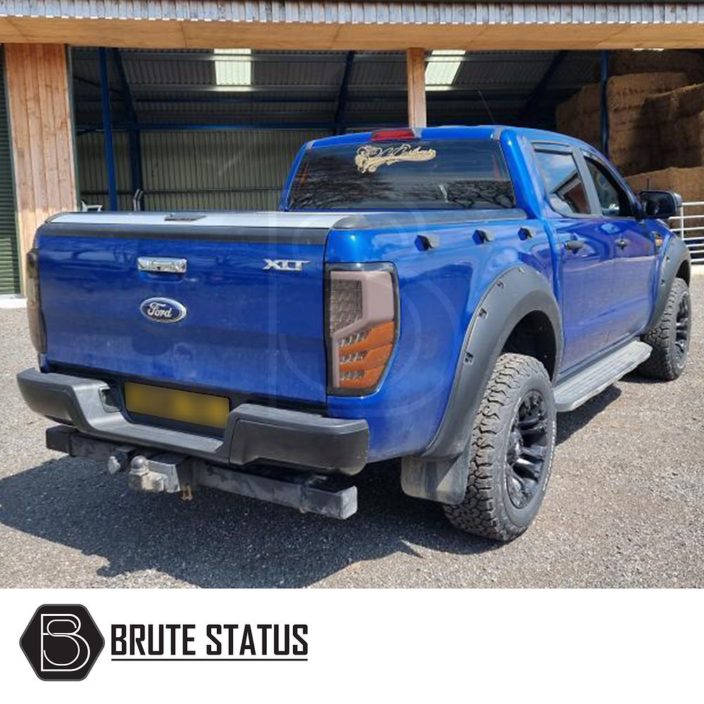 Ford Ranger T6 T7 T8 smoked LED tail light set for 2012-2022 models with sequential indicators and direct OEM style mounting points. 