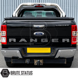 Rear chrome silver metal bumper fitted to black Ford Ranger pickup truck offroad 4x4 vehicle. Suitable for overlanding set ups and compatible with rear parking sensors. 