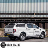 Ford Ranger 2012-2022 Truckman Grand Hardtop Canopy with remote locking, enhancing storage and security, parked on an industrial lot.