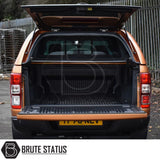 Ford Ranger 2012-2022 Truckman Grand Hardtop Canopy - Remote Locking shown open, highlighting empty ribbed truck bed. Canopy enhances storage with stylish, secure features.