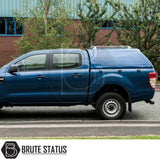 Ford Ranger 2012-2022 Truckman RS Hardtop Canopy with solid rear window, parked beside a road, enhancing security and utility for commercial use.