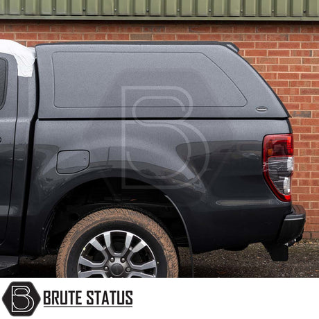Rear view of a Ford Ranger 2012-2022 with a Truckman RS Hardtop Canopy, featuring a solid-sided design for enhanced cargo security.