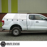 Side view of a Ford Ranger with Truckman RS Hardtop Canopy, featuring a solid rear window and remote locking, enhancing security and functionality for commercial use.