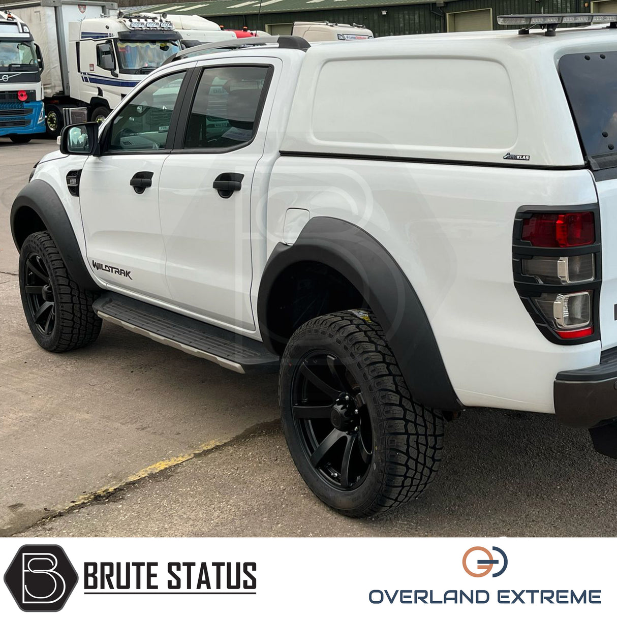 Ford Ranger 2012-2022 Wide Arch Kit (Overland Extreme) in showroom, highlighting premium wide wheel arches and large tires, emphasizing durability and precision design.