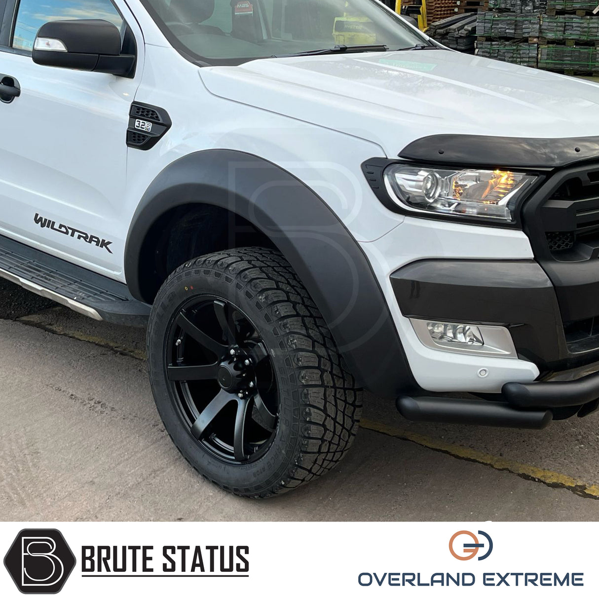 Ford Ranger 2012-2022 Wide Arch Kit (Overland Extreme) in showroom, highlighting premium wide wheel arches and large tires, emphasizing durability and precision design.