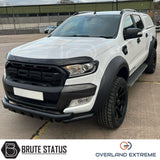 Ford Ranger 2012-2022 Wide Arch Kit (Overland Extreme) in showroom, highlighting premium wide wheel arches and large tires, emphasizing durability and precision design.