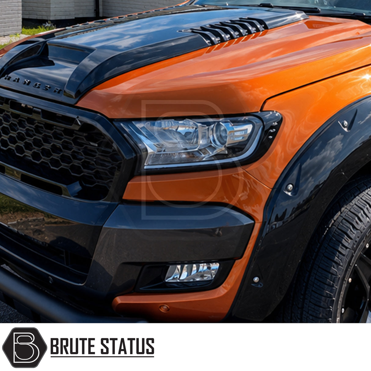 Front mounting smooth gloss black headlight covers fitted to Ford Ranger 2015-2022 pickup truck offroad 4x4 vehicle. Pre-applied with strong 3M tape adhesive. 