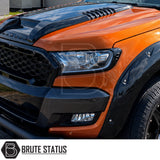 Front mounting smooth gloss black headlight covers fitted to Ford Ranger 2015-2022 pickup truck offroad 4x4 vehicle. Pre-applied with strong 3M tape adhesive. 