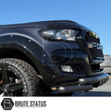 Front headlight covers in gloss black, pre-installed with strong 3M tape adhesive mounted onto front of Ford Ranger pick up truck offroad 4x4 vehicle. 