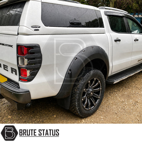 Ford Ranger 2019-2022 T8 wide wheel arch kit, Raptor style ABS fender flares with decorative stainless steel rivets and smooth black finish.