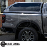 Gray Ford Ranger 2023+ T9 with Truckman Grand Hardtop Canopy featuring tinted windows, Goodyear wheels, and Brute Status branding.