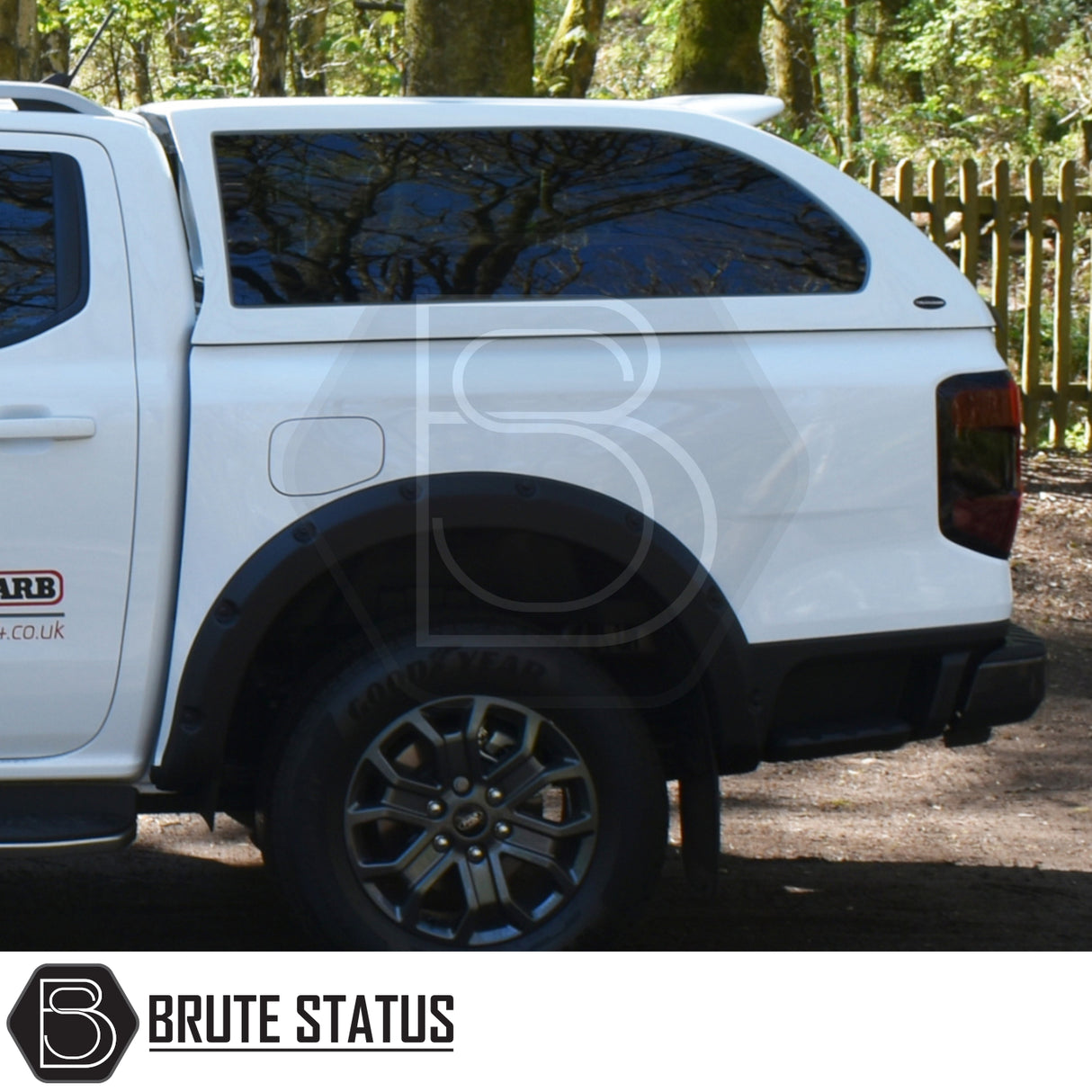 Ford Ranger 2023+ T9 Truckman Grand Hardtop Canopy with tinted windows, alloy wheel, and BRUTE STATUS logo, showcasing premium design and remote locking.