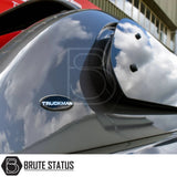 Close-up of Ford Ranger 2023+ T9 Truckman Grand Hardtop Canopy showing smoked side-window visor with TRUCKMAN badge, reflecting clouds, and BRUTE STATUS watermark.