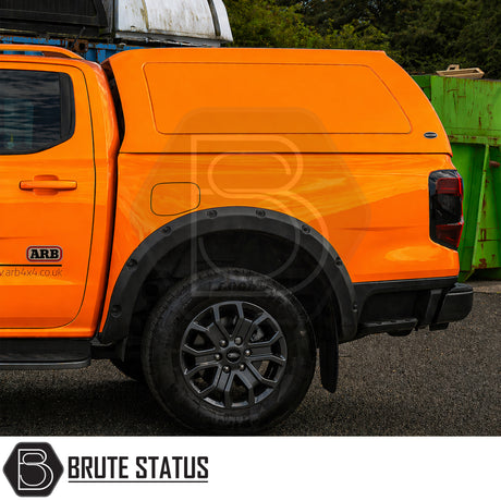 Heavy duty hardtop canopy colour matched to Ford Ranger bright Cyber Orange 2023+ suitable for secure overlanding offroad 4x4 set ups. 