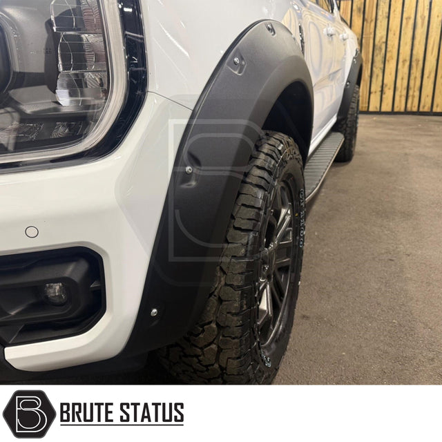 Ford Ranger T9 2023+ wide arch kit Overland Extreme riveted style in matte black fitted to double cab for aggressive off-road styling