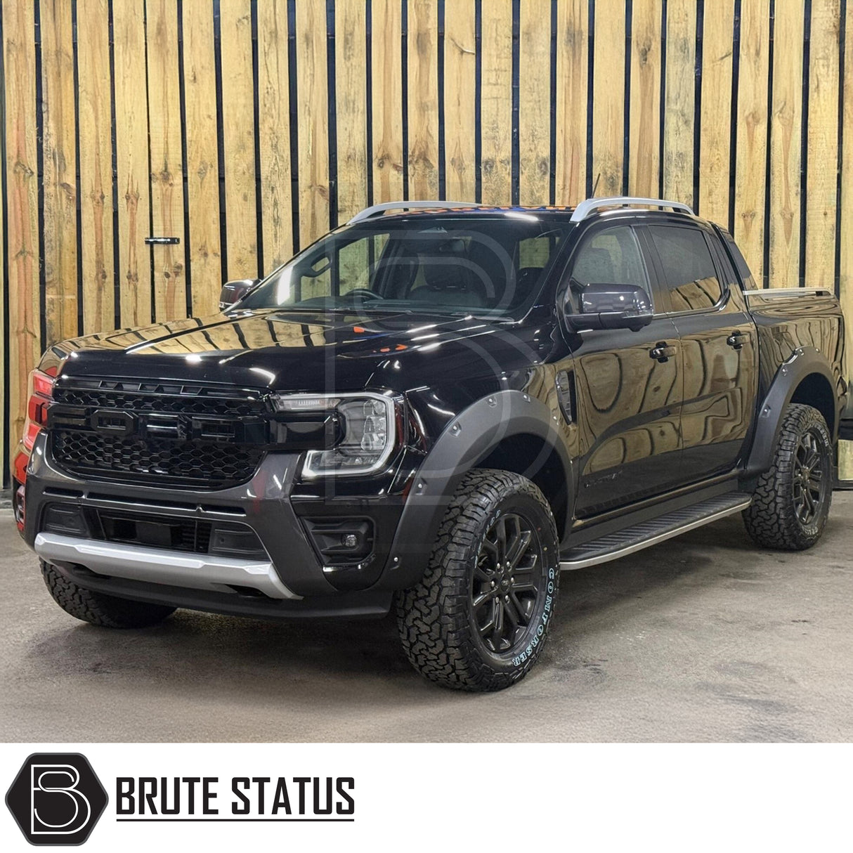 Aftermarket wide arch kit for Ford Ranger T9 2023+ featuring riveted overland design, rubber seal fitment, and matte black finish