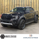 Front and rear smooth slightly textured matte black riveted style arch kit fitted to Ford Ranger 2023+ pickup truck offroad 4x4 vehicle. Suitable for overlanding set ups and additional protection, all fittings needed for install. 