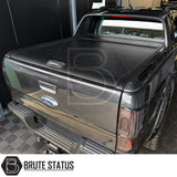 Rear smooth black finish roller shutter bed cover protector fitted to Ford Ranger Wildtrak with factory sports roll bar. Full mounting hardware included. 