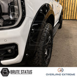 Gloss black Ford Ranger T9 wide arch kit featuring Overland Extreme wheel arch flares with cosmetic rivets and precision CAD-designed fitment.