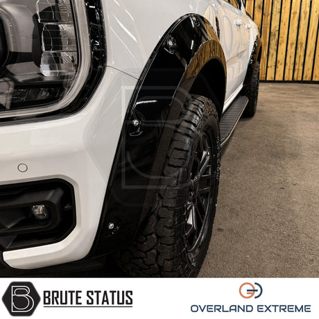 Gloss black Ford Ranger T9 wide arch kit featuring Overland Extreme wheel arch flares with cosmetic rivets and precision CAD-designed fitment.