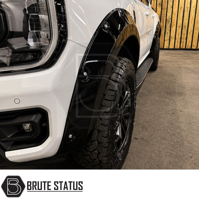 Ford Ranger T9 2023+ Wide Arch Kit Overland Extreme riveted style in gloss black fitted to double cab pickup for aggressive off-road styling