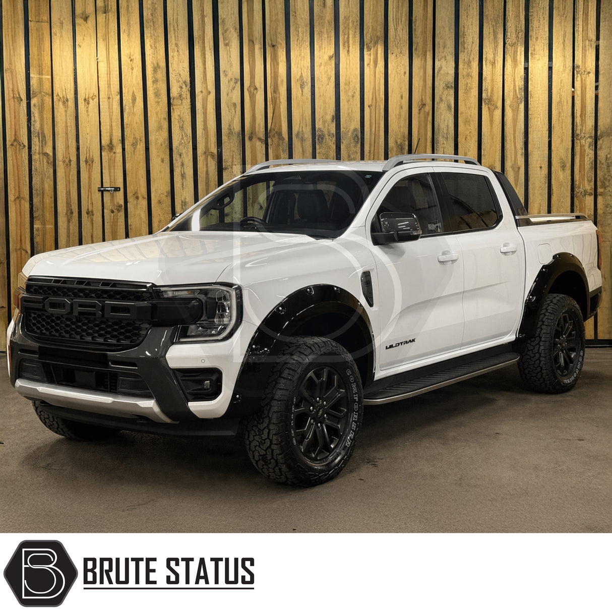 Aftermarket wide arch kit for Ford Ranger T9 2023+ featuring riveted overland design, rubber seal fitment, and gloss black finish
