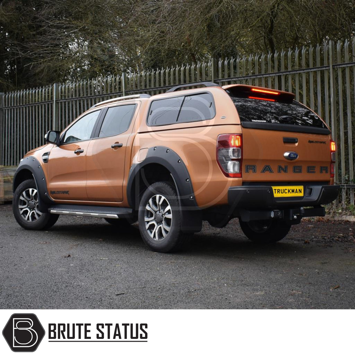 Ford Ranger with Truckman GLS Hardtop Canopy, featuring remote locking and tinted sliding windows, enhancing secure storage and pet-friendly ventilation.