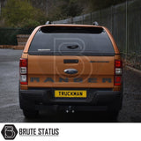 Ford Ranger 2012-2022 Truckman GLS Hardtop Canopy with remote locking, seen from the rear, featuring a tow hitch, Truckman branding, and tinted, lockable windows for secure storage.