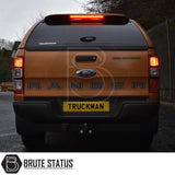 Orange Ford Ranger Wildtrak with a Truckman GLS Hardtop Canopy, showcasing rear view with RANGER lettering, emphasizing remote locking and secure sliding windows.