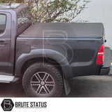 Tonneau Cover for Fiat Fullback 2015-2019 Double Cab with tri-fold design and durable UV-stable vinyl, featuring rubber seals and aluminium securing catch.