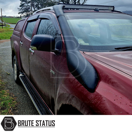 Isuzu D-Max 2012-2021 Window Deflector Sun Shade, a premium black acrylic accessory for improved aerodynamics and rain protection, visible on a vehicle close-up.