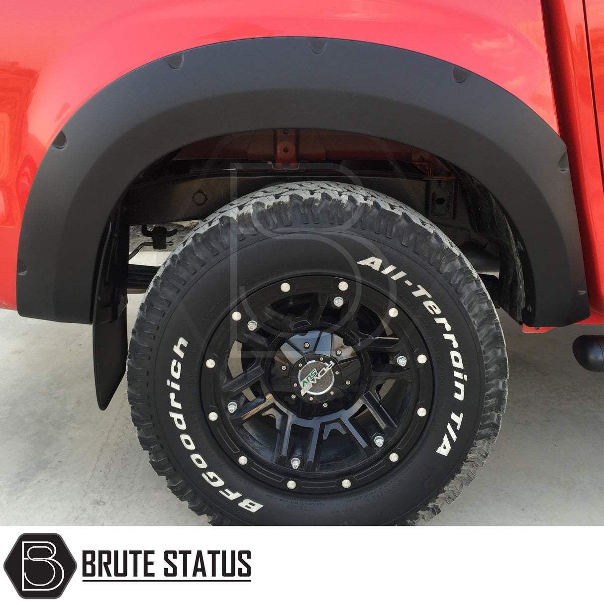 Wide arch kit fitted on Isuzu D-Max Double Cab (2012–2015 pre-facelift), featuring aggressive fender flares in matte black ABS plastic for off-road styling and enhanced stance.