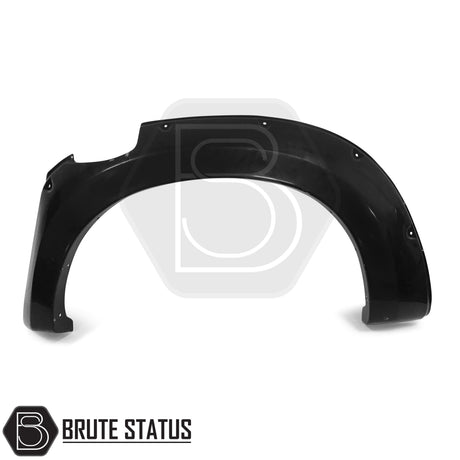 Wide arch kit fitted on Isuzu D-Max Double Cab (2012–2015 pre-facelift), featuring aggressive fender flares in matte black ABS plastic for off-road styling and enhanced stance.