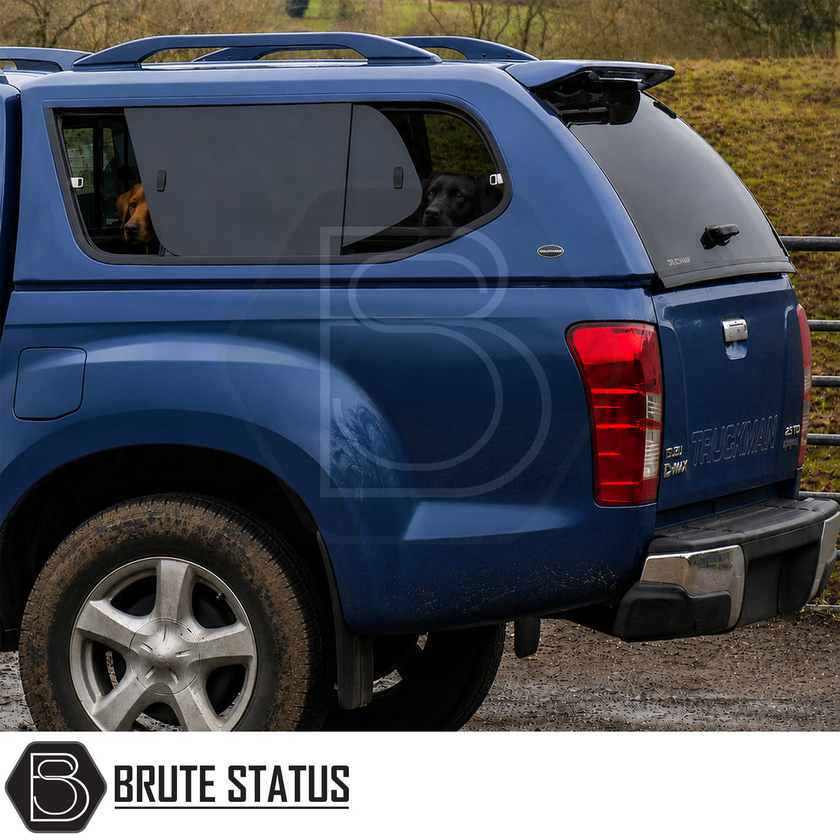 Truckman GLS canopy fitted to Isuzu D-Max pickup truck with roof bars and heated rear window