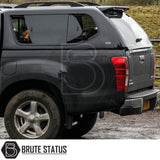 Isuzu D-Max 2012-2021 Truckman GLS Hardtop Canopy with dogs in sliding windows, showcasing remote locking and roof bars on a black pickup truck.