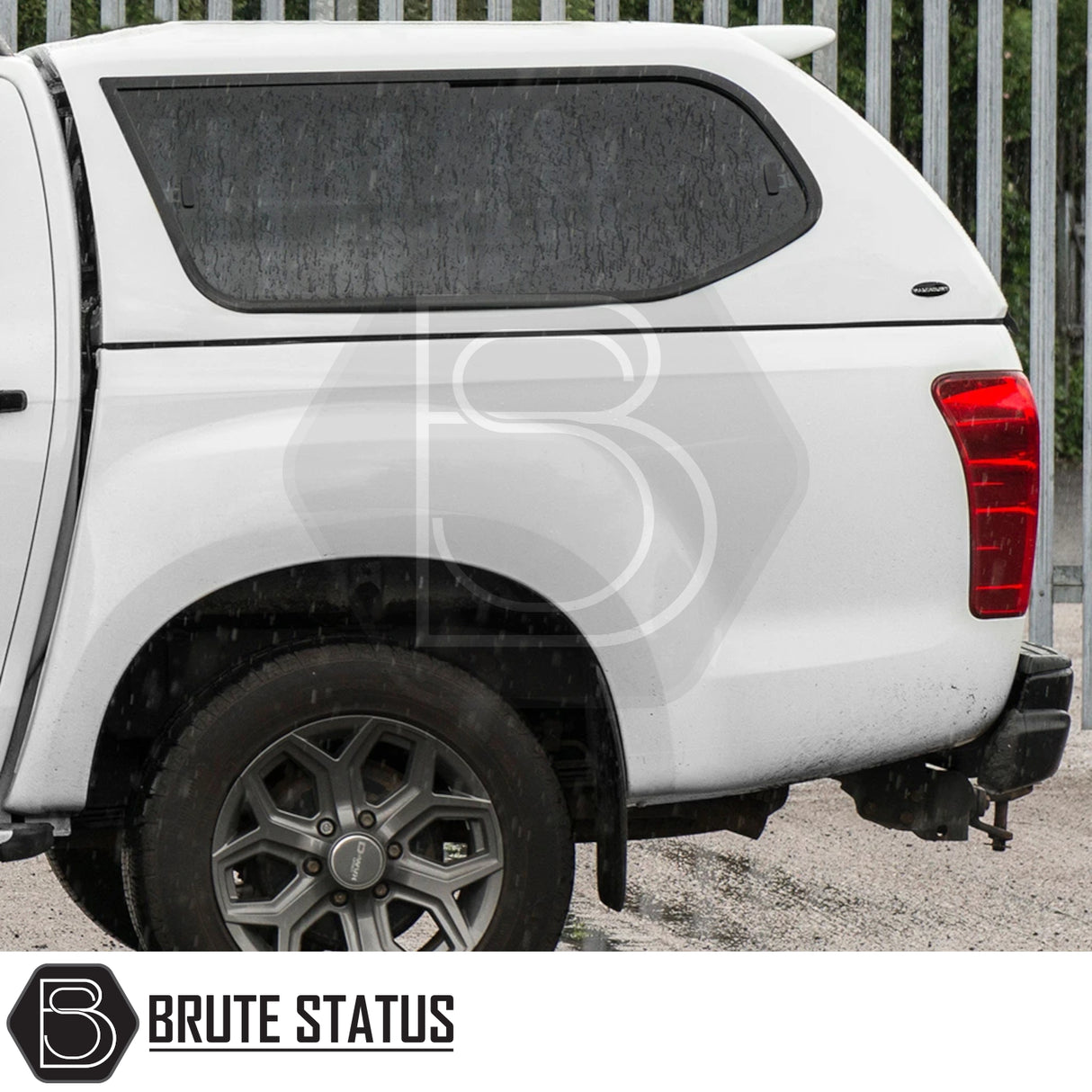 Isuzu D-Max 2012-2021 Truckman GLS Hardtop Canopy with remote locking, roof bars, tinted side window, displayed on a white pickup, promoting secure, stylish truck storage.