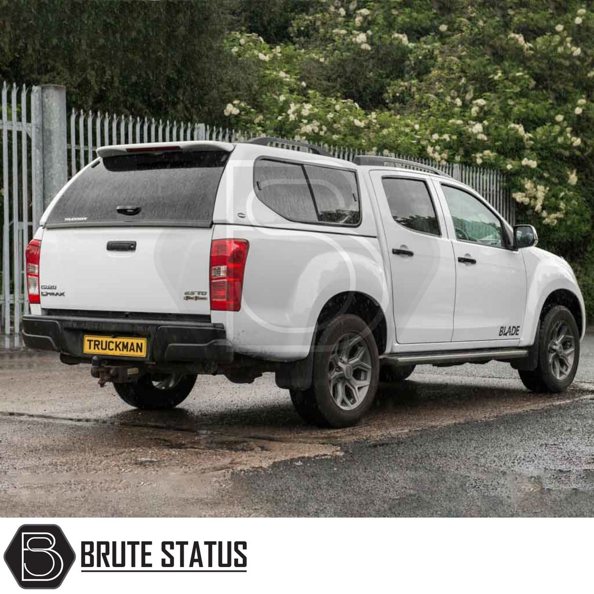 Isuzu D-Max 2012-2021 Truckman GLS Hardtop Canopy with remote locking and roof bars, showcasing sporty design and features like sliding windows and tinted glass.