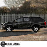 Isuzu D-Max 2012-2021 Truckman Grand Hardtop Canopy with remote locking, featuring a cab-high design and tinted windows on a black pickup truck.
